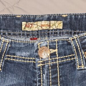 BKE Women's Distressed Blue Boot Cut Jeans